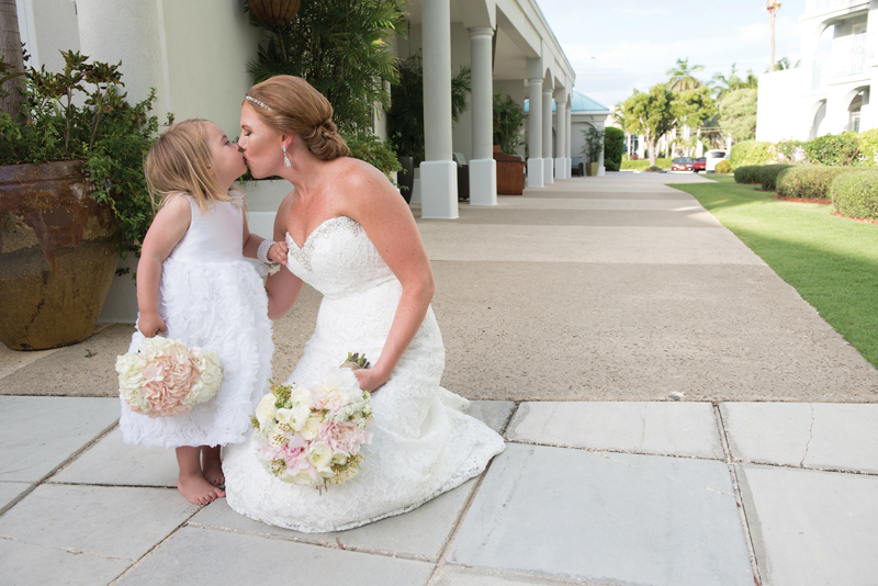 Bride kissing a kid